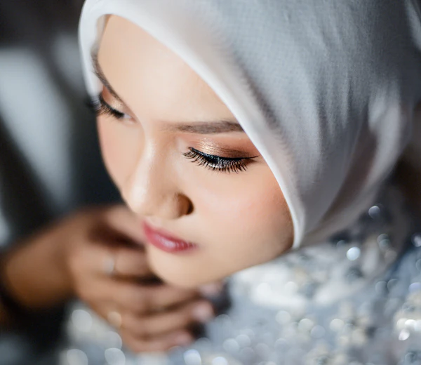 Soft glam makeup with a white hijab